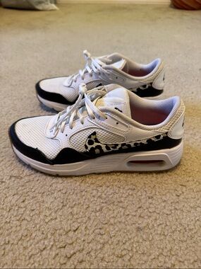 Nike White Athletic Sneakers with Leopard Swoosh